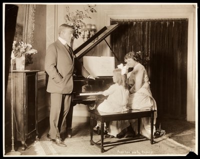 Robert Edeson, His Wife and Daughter at the Piano, c.1915 by Byron Company